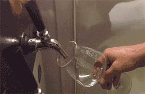 GIF of a homebrew being poured out of a tap keezer